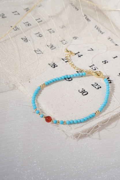 Turquoise Color Red Accents Bracelet — real product photo