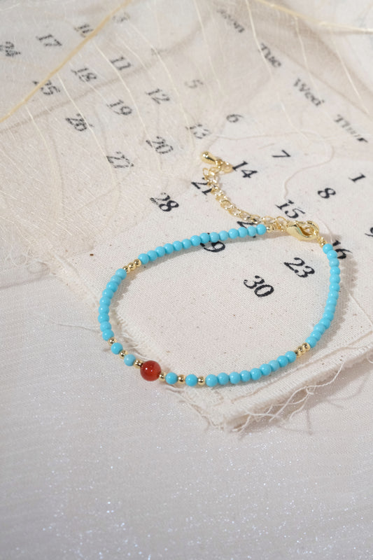 Turquoise Color Red Accents Bracelet — real product photo