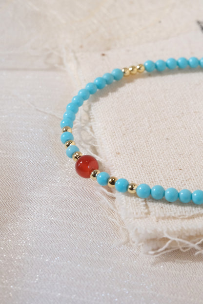 Turquoise Color Red Accents Bracelet — real product photo
