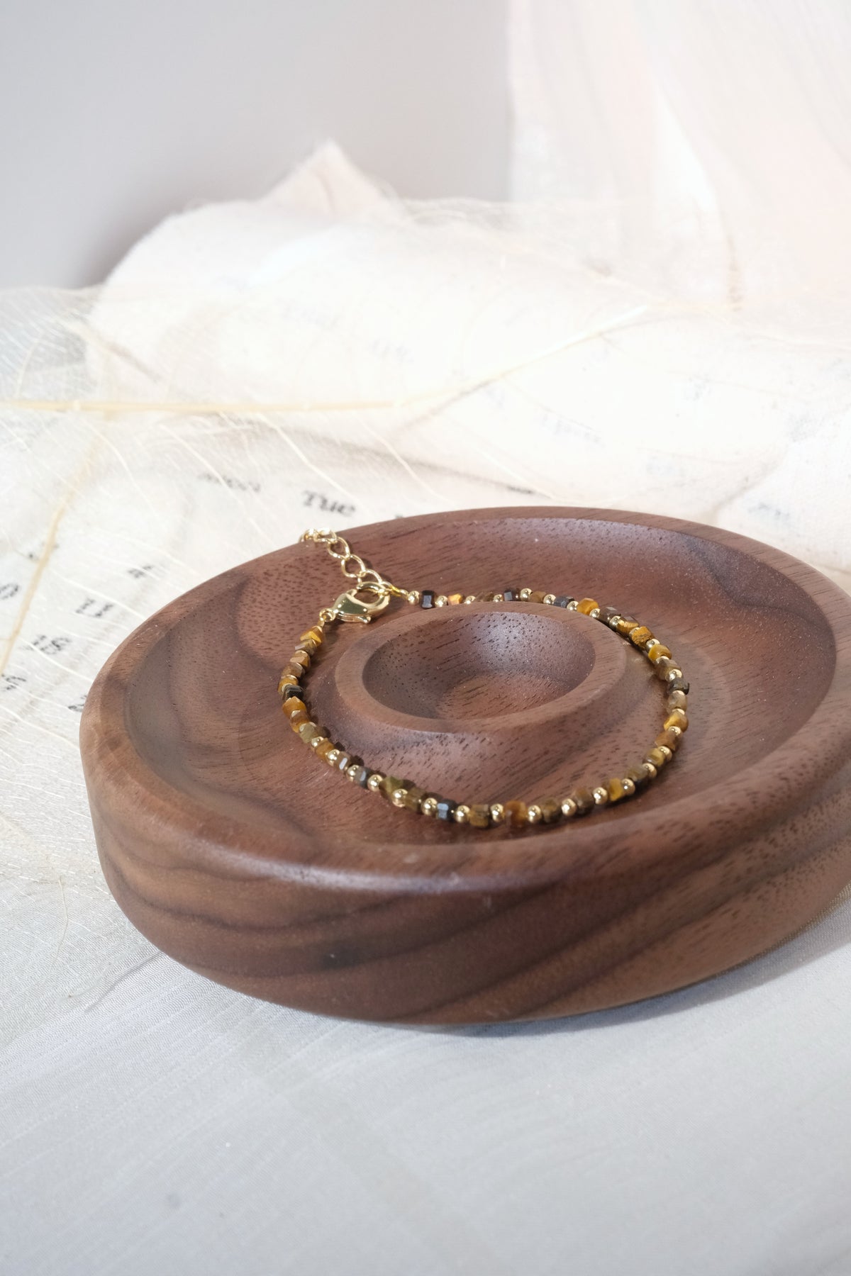 Brown Round Gold Tone Spacers Bracelet — real product photo