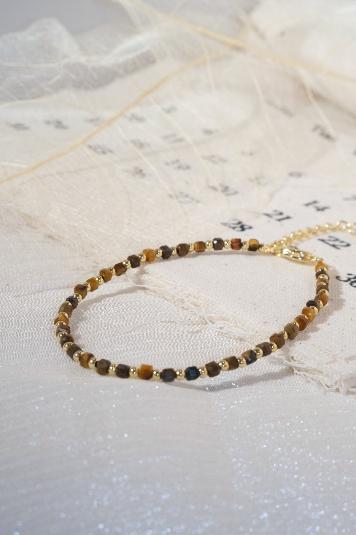 Brown Round Gold Tone Spacers Bracelet — real product photo