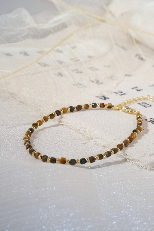 Brown Round Gold Tone Spacers Bracelet — real product photo