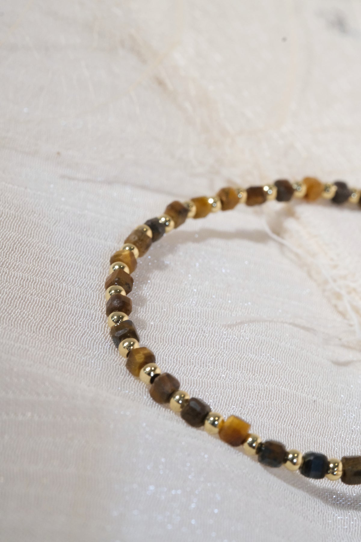 Brown Round Gold Tone Spacers Bracelet — real product photo