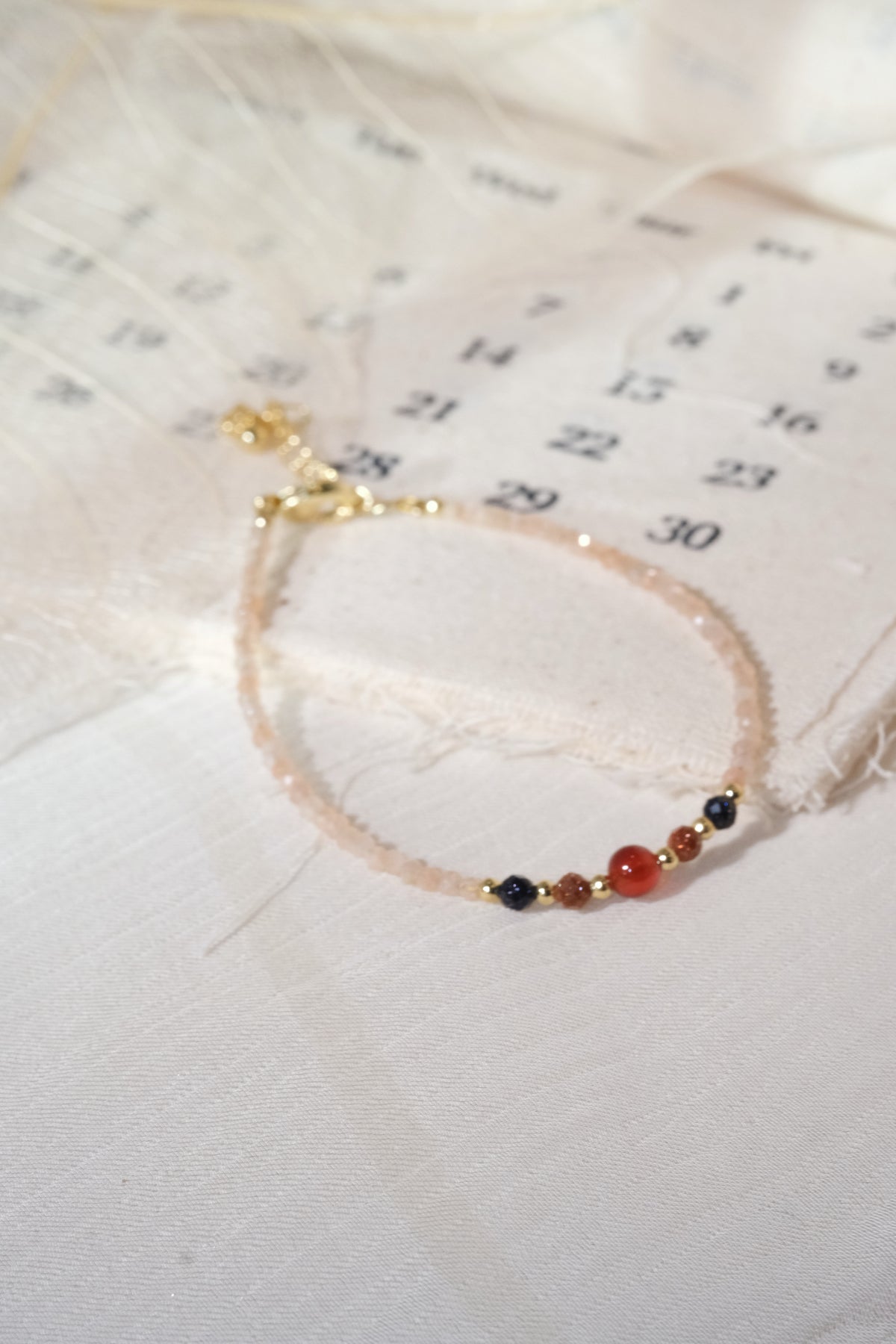 Peach Dark Red Accents Bracelet — real product photo