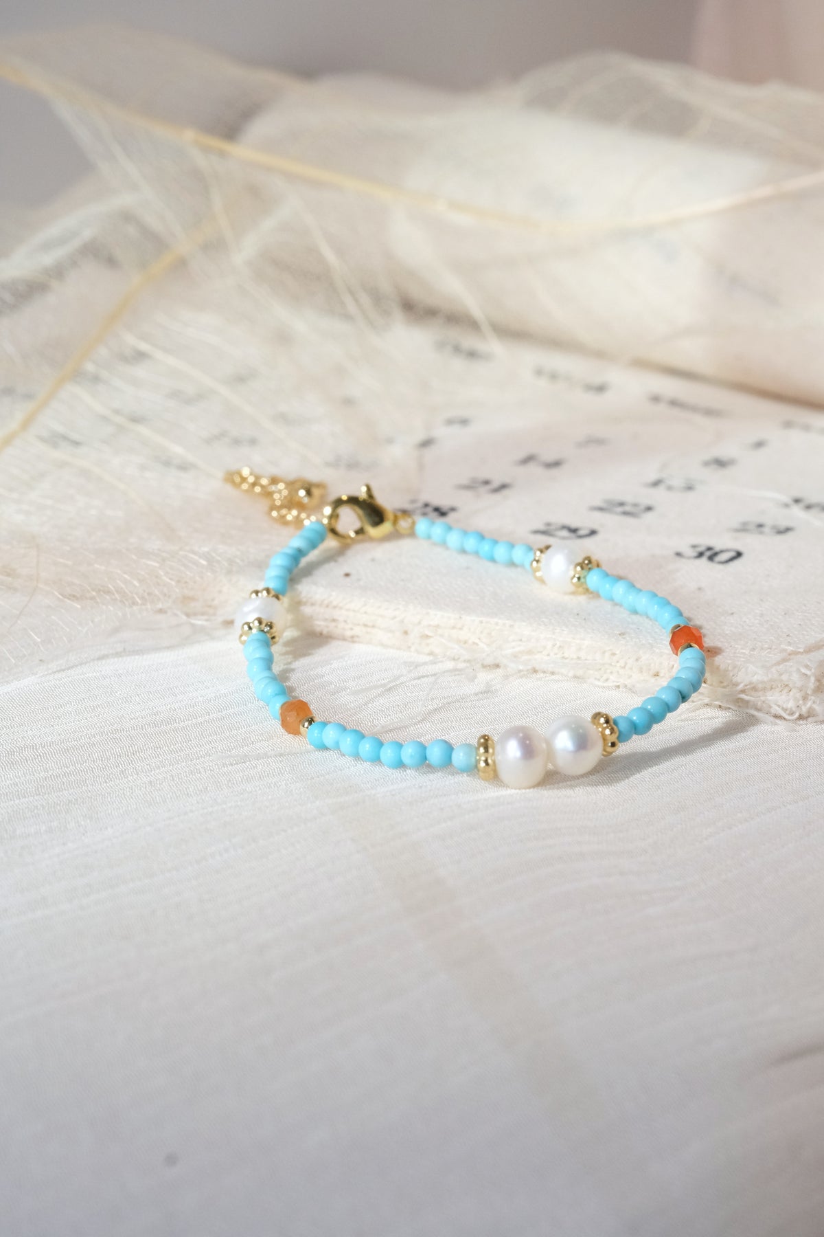 Turquoise Color White Oval Beads Bracelet — real product photo