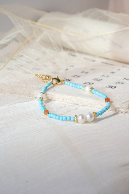 Turquoise Color White Oval Beads Bracelet — real product photo