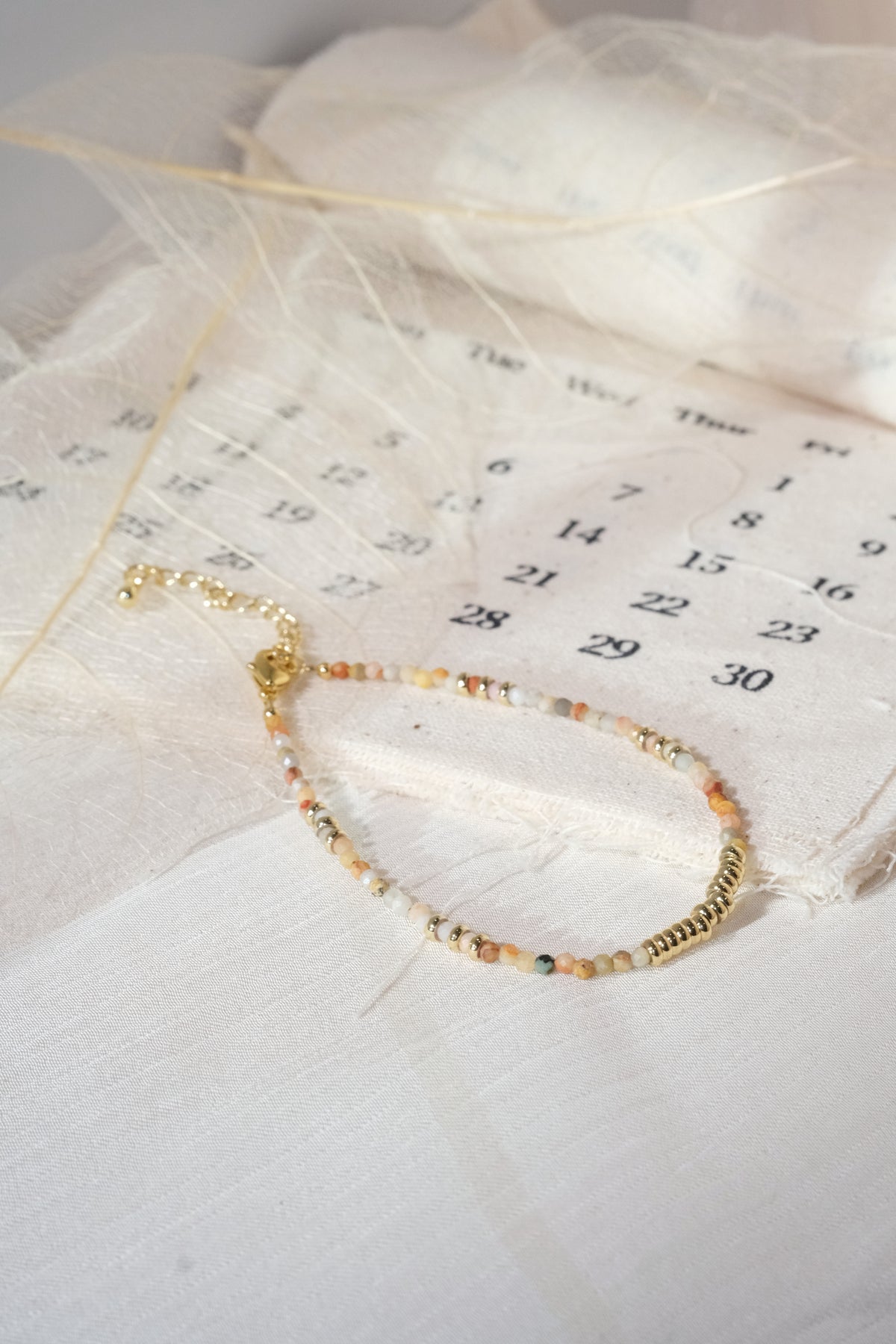 Cream Multicolor Gold Tone Ribbed Bar Bracelet — real product photo