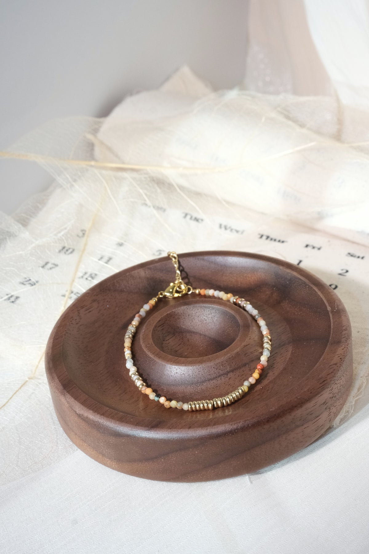 Cream Multicolor Gold Tone Ribbed Bar Bracelet — real product photo