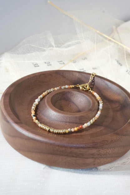 Cream Multicolor Gold Tone Ribbed Bar Bracelet — real product photo