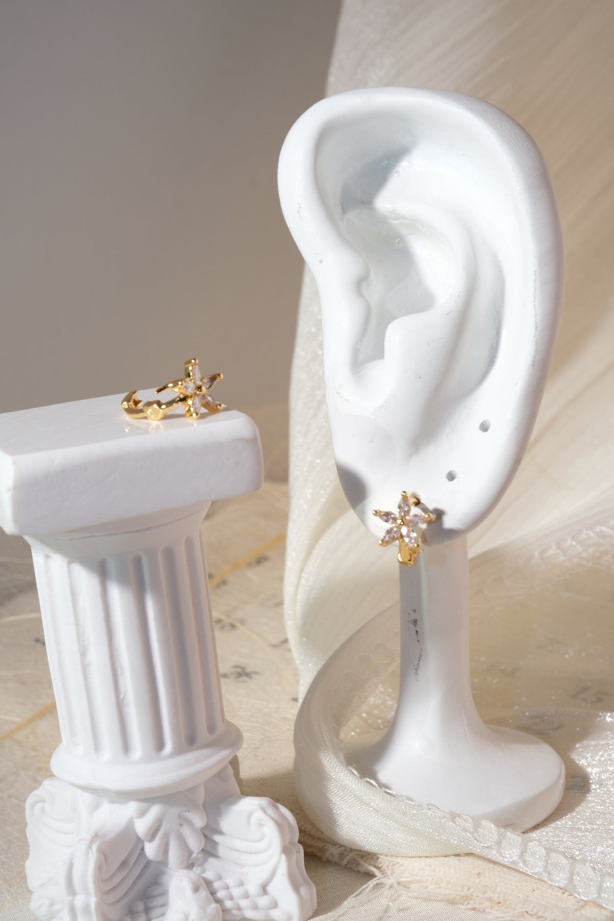 Gold Tone Five Petal Hoops Earrings — real product photo