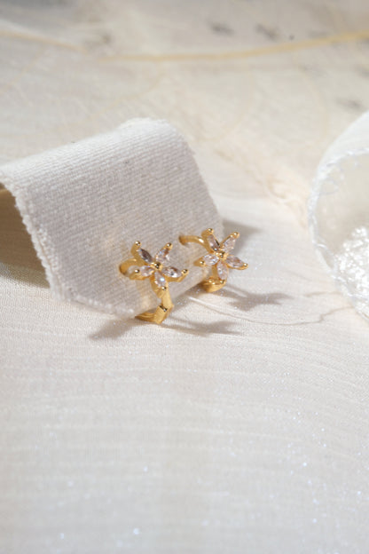 Gold Tone Five Petal Hoops Earrings — real product photo