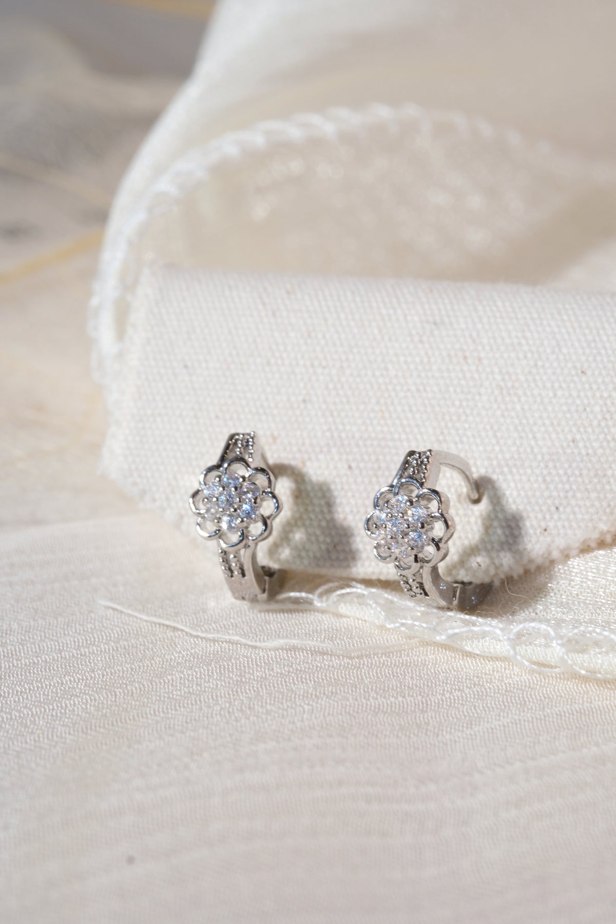 Silver Tone Floral Hoops Earrings — real product photo