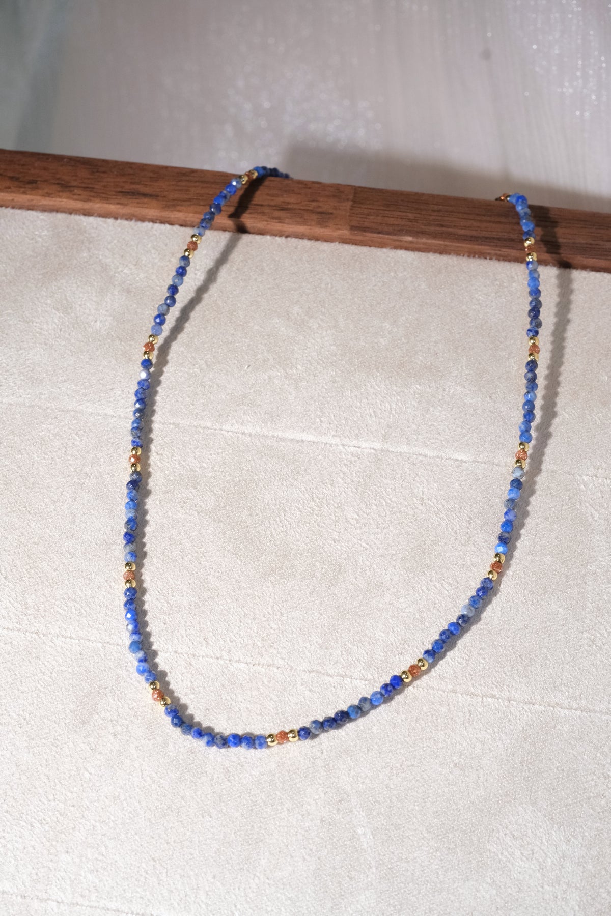 Blue Faceted Gold Tone Spacers Necklace — real product photo