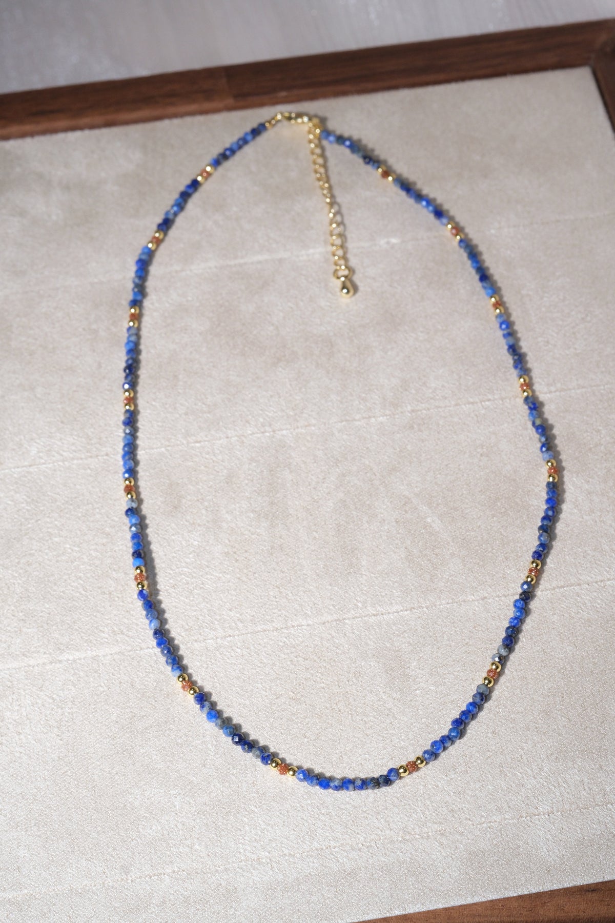 Blue Faceted Gold Tone Spacers Necklace — real product photo
