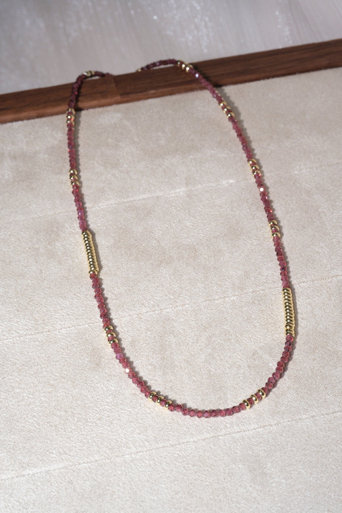Maroon Gold Tone Ribbed Bar Necklace — real product photo