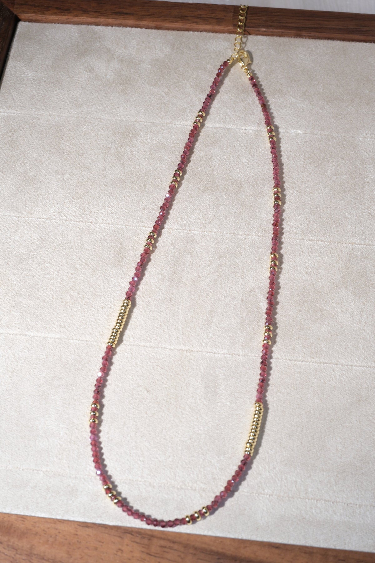 Maroon Gold Tone Ribbed Bar Necklace — real product photo