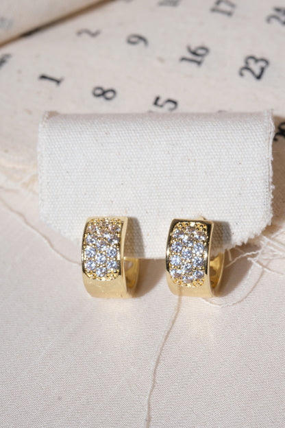 Gold Wide Pave Huggie Earrings — edited real product photo