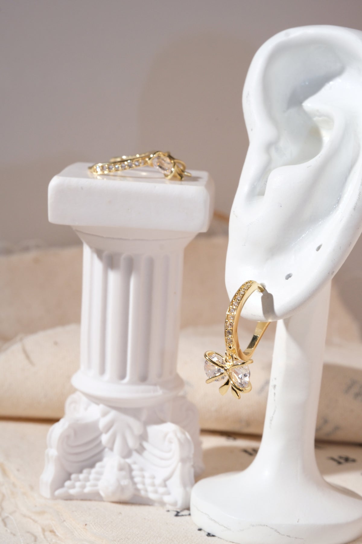 Gold Bow Dangle Hoop Earrings — edited real product photo