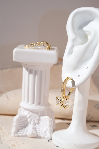 Gold Bow Dangle Hoop Earrings — edited real product photo