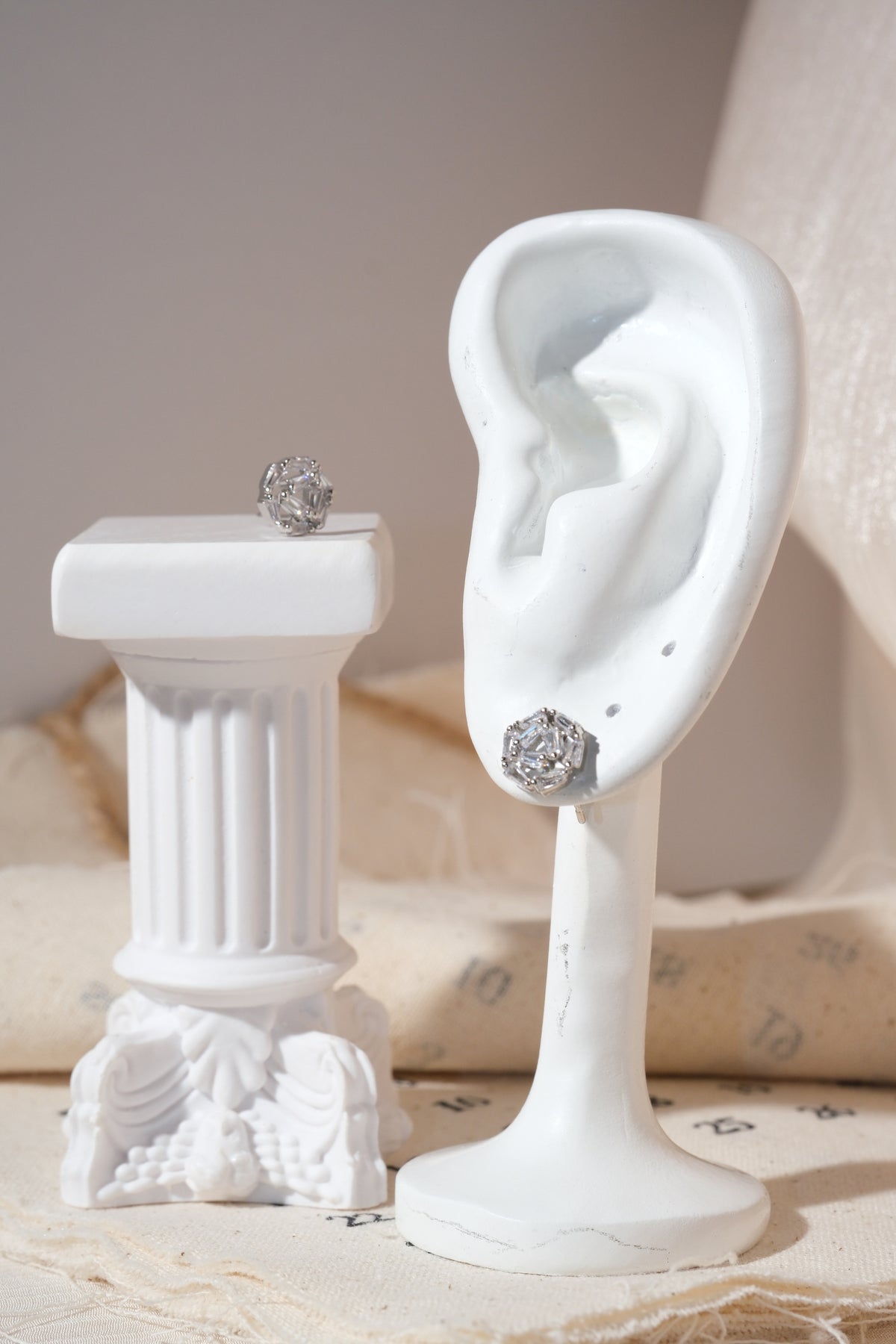 Silver Baguette Rosette Stud Earrings — edited real product photo
