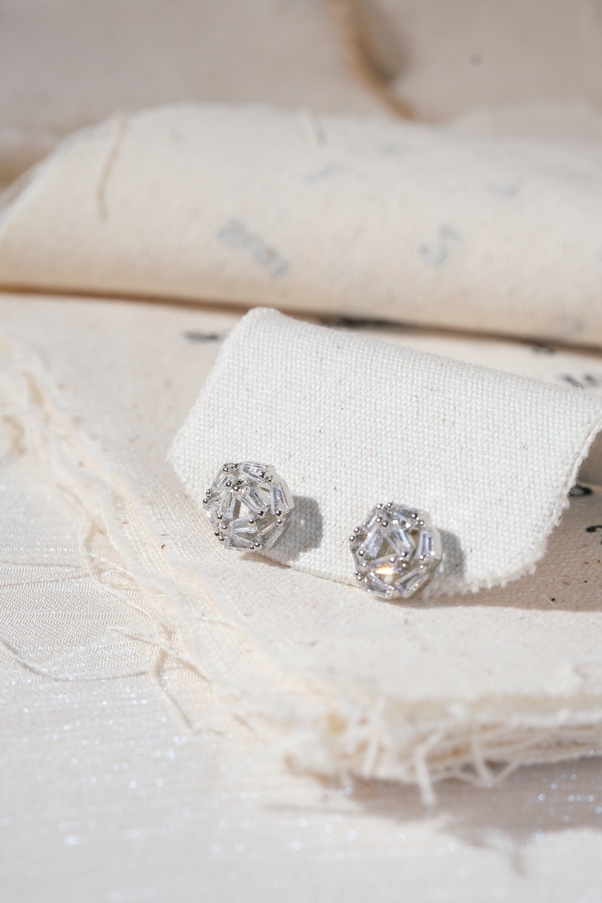 Silver Baguette Rosette Stud Earrings — edited real product photo