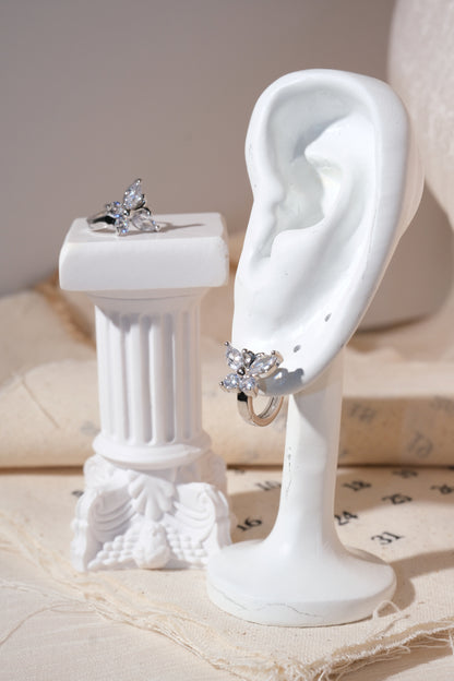 Silver Butterfly CZ Huggie Earrings — edited real product photo