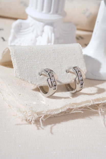 Silver Crossover CZ Huggie Earrings — edited real product photo
