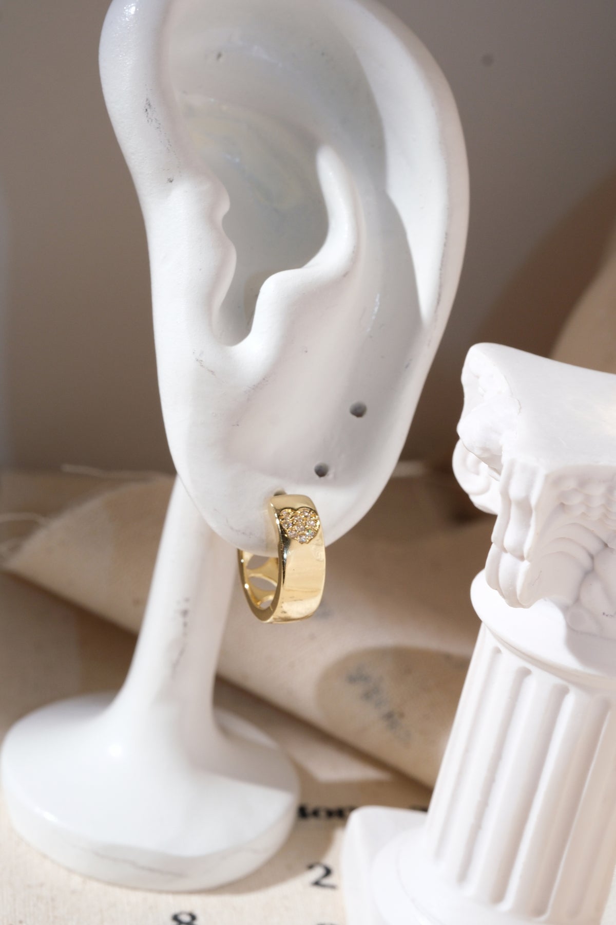 Gold Pave Heart Inlay Huggie Earrings — edited real product photo