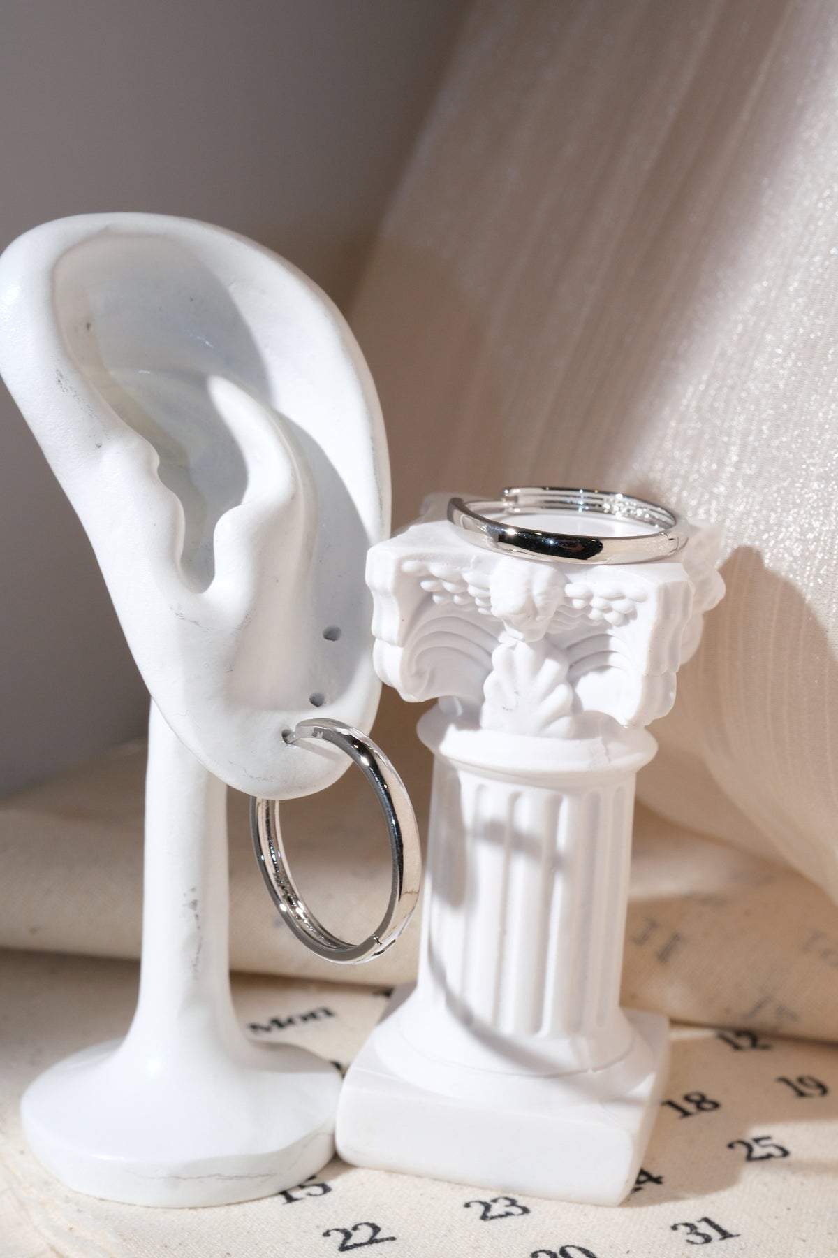 Silver Polished Hoop Earrings — edited real product photo