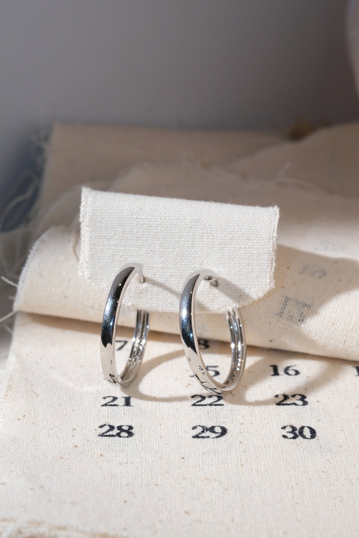 Silver Polished Hoop Earrings — edited real product photo