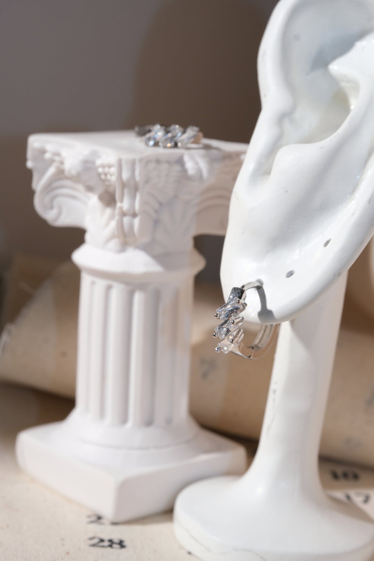 Silver Triple Baguette CZ Huggie Earrings — edited real product photo