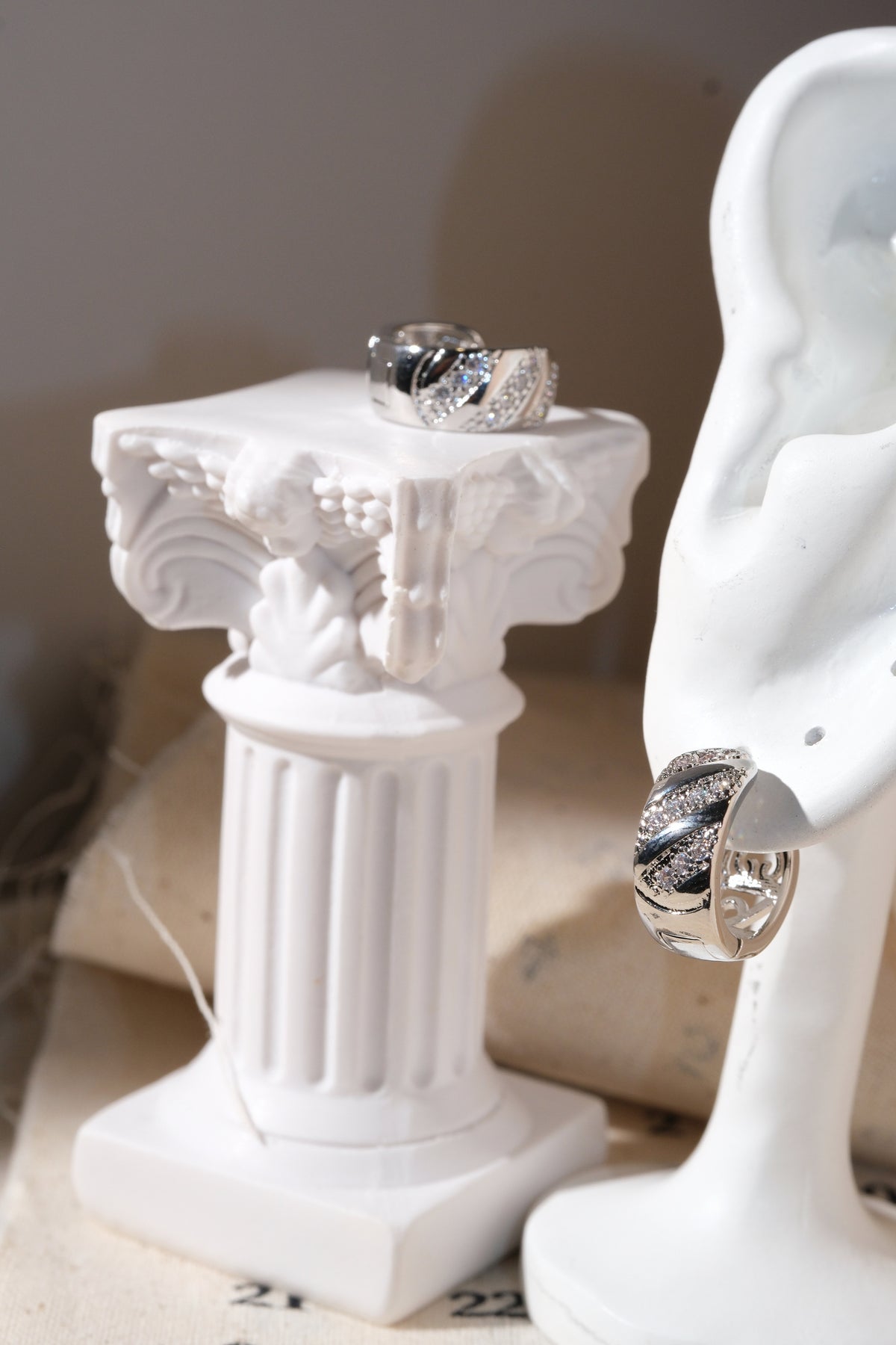 Silver Diagonal Pave Huggie Earrings — edited real product photo