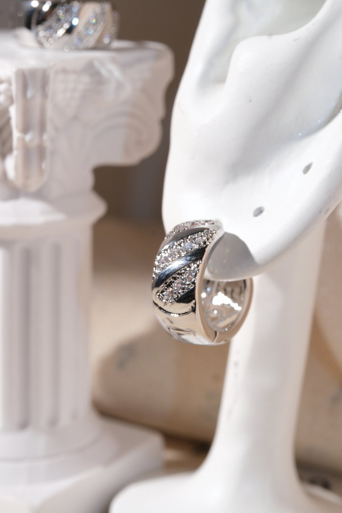 Silver Diagonal Pave Huggie Earrings — edited real product photo