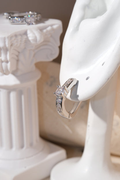 Silver Solitaire CZ Huggie Earrings — edited real product photo