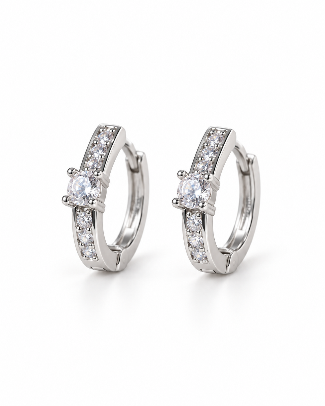 Silver Solitaire CZ Huggie Earrings — white background