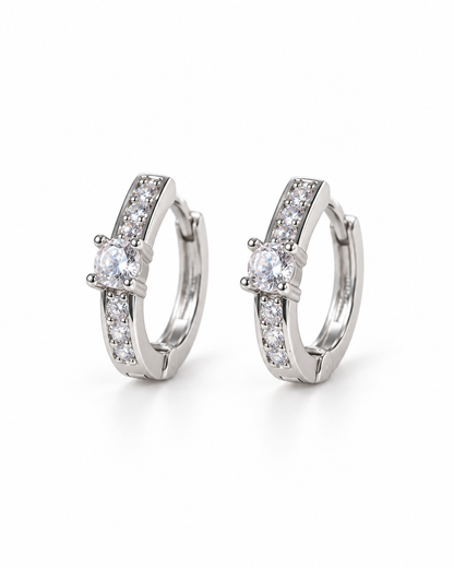 Silver Solitaire CZ Huggie Earrings — white background