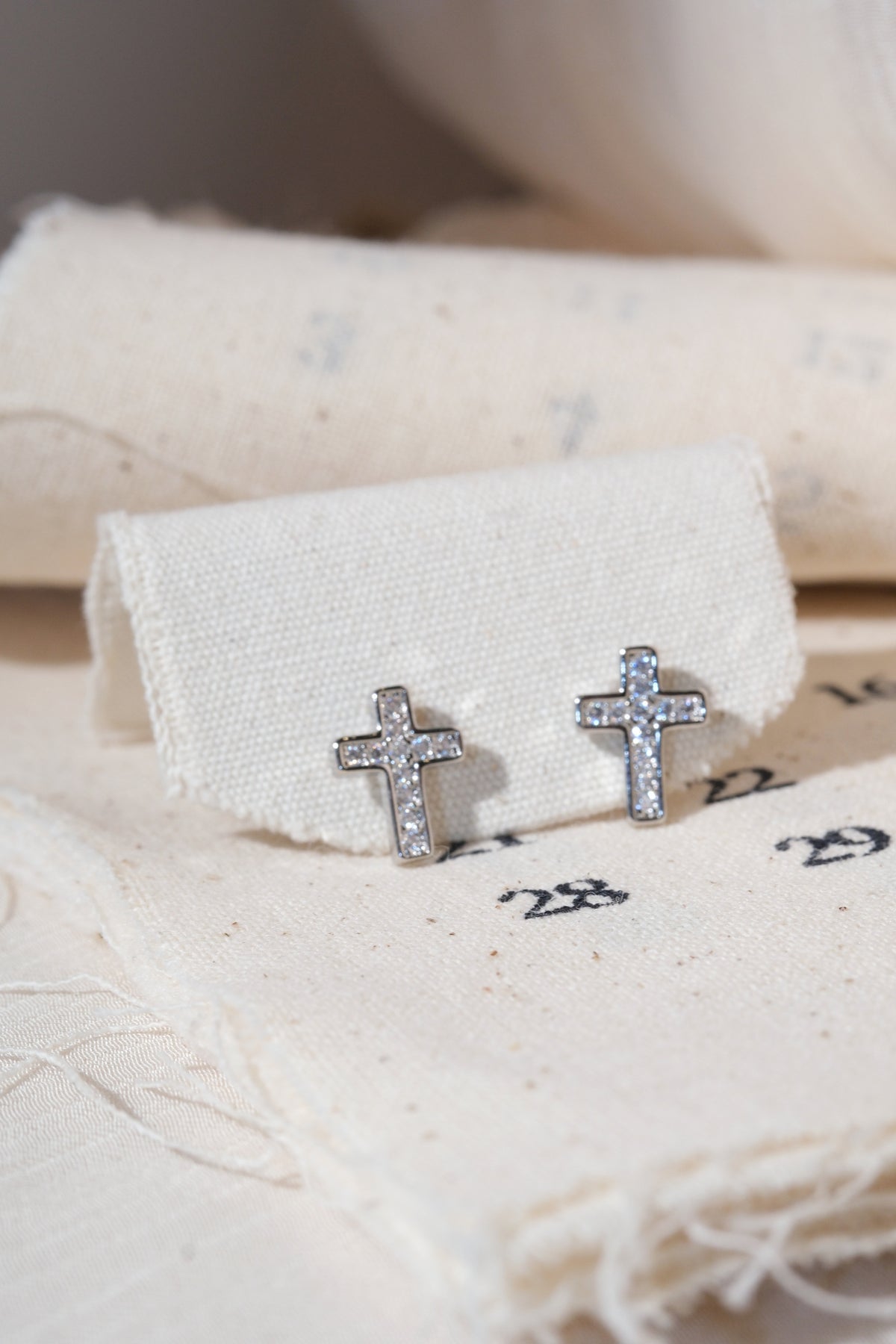 Silver CZ Cross Stud Earrings — edited real product photo