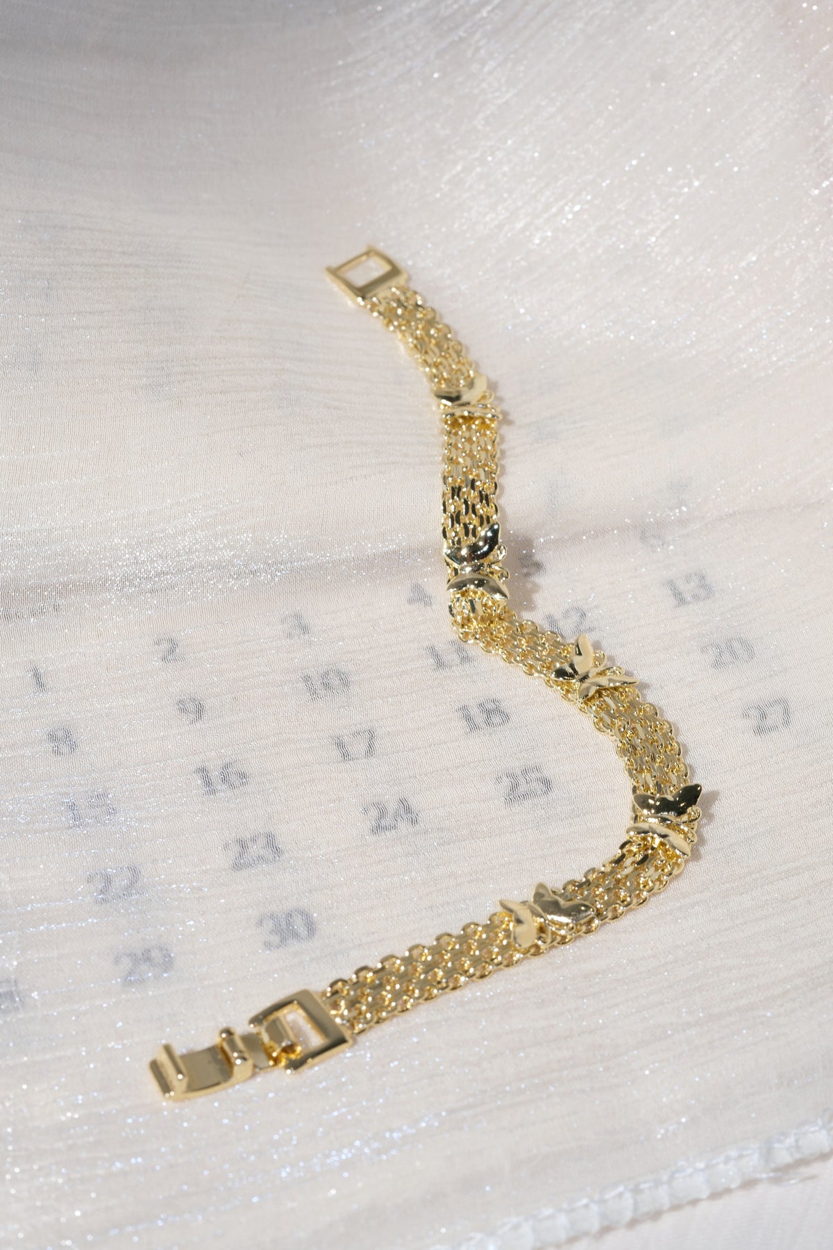 Multistrand Cross Station Bracelet — Gold — edited real product photo