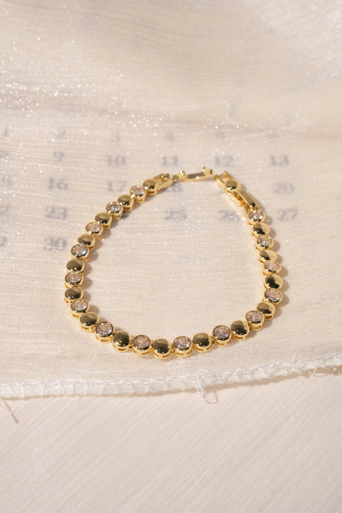 CZ and Disc Station Bracelet — Gold — edited real product photo