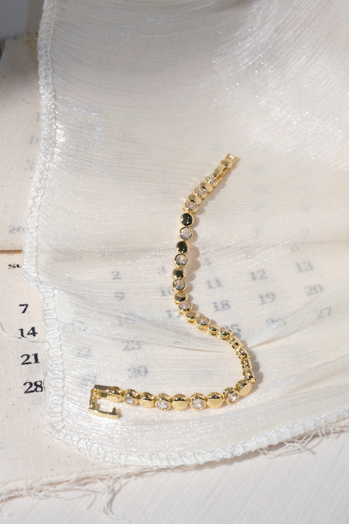 CZ and Disc Station Bracelet — Gold — edited real product photo
