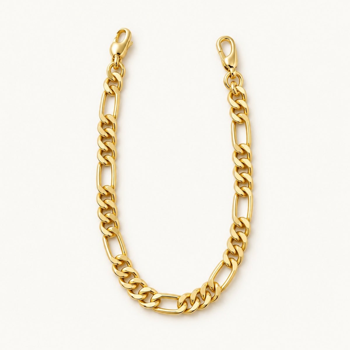 Figaro Chain Bracelet — Gold — white background