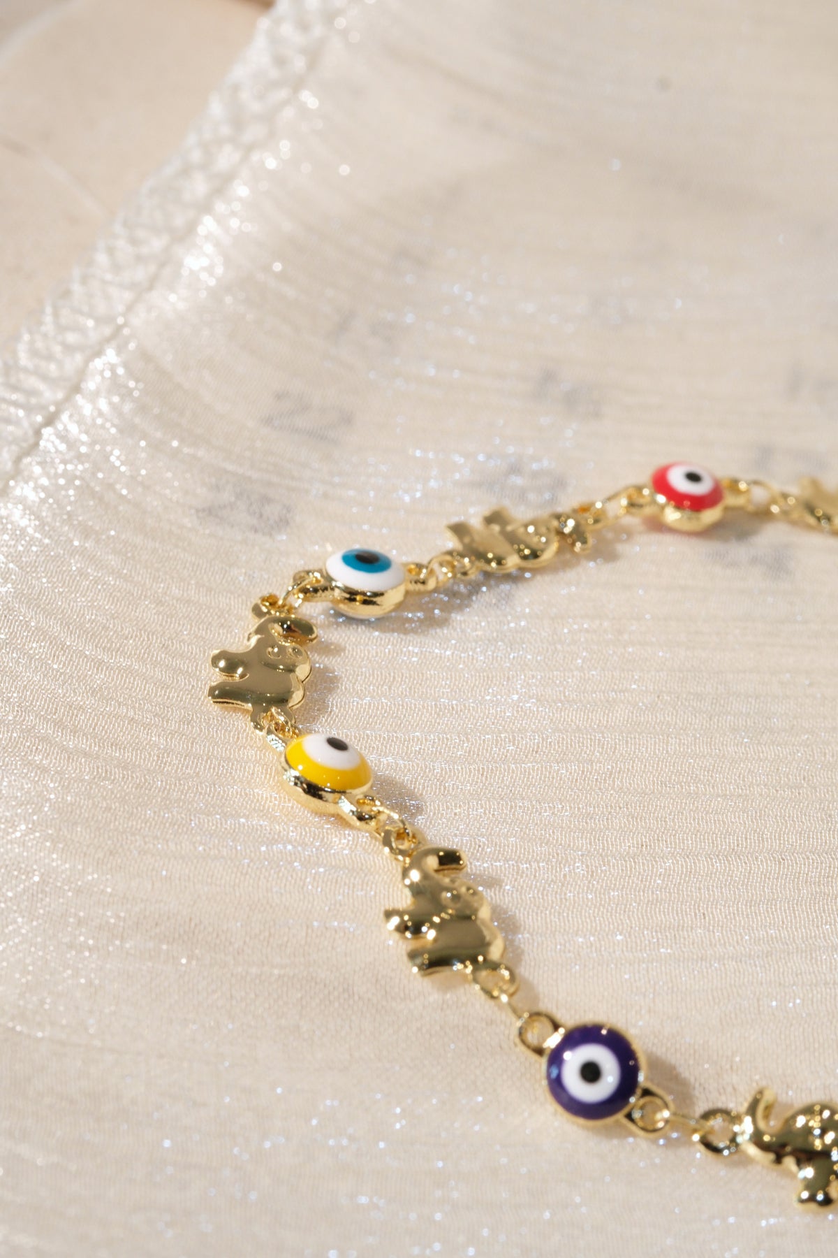 Colorful Eye and Elephant Bracelet — Gold — edited real product photo