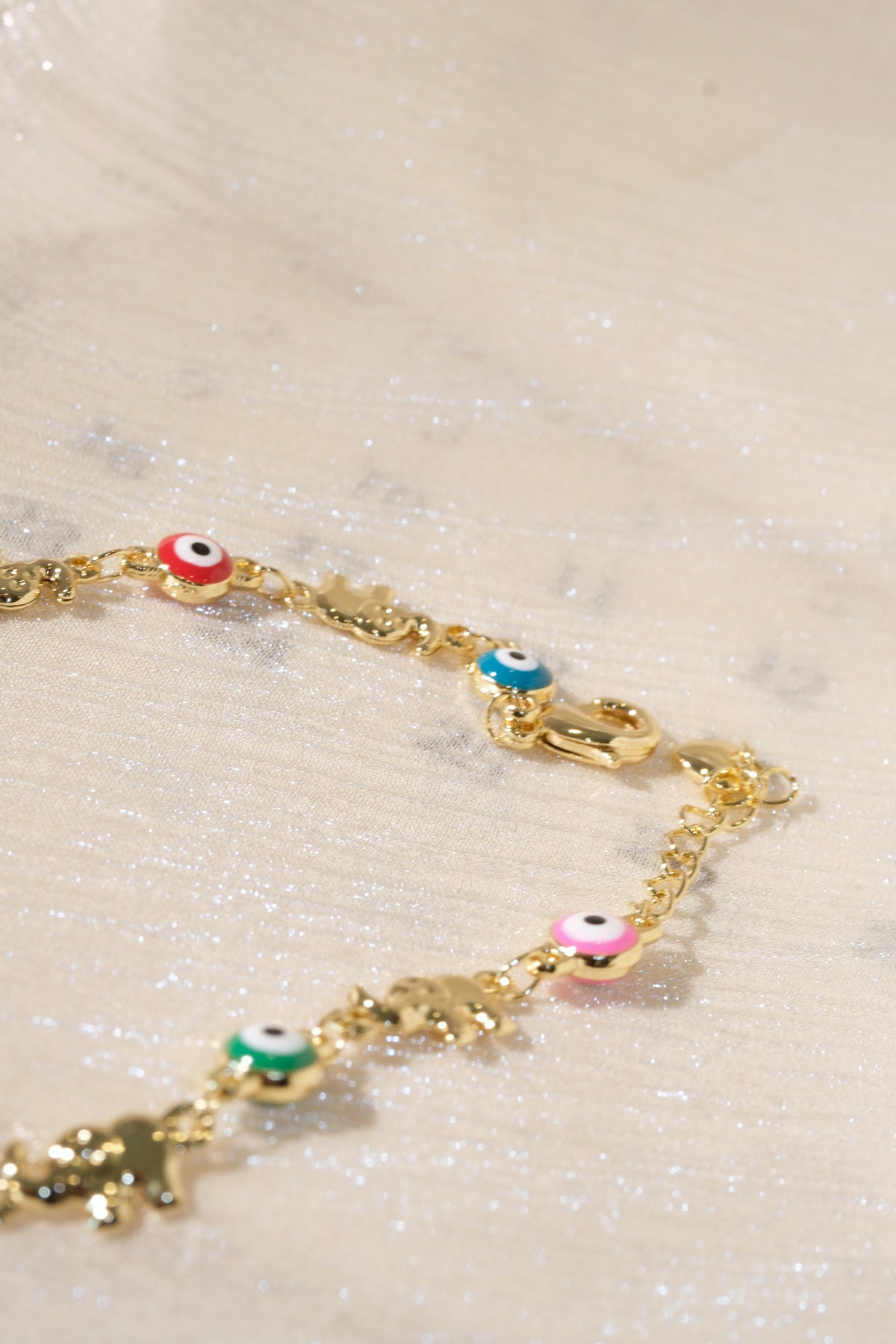 Colorful Eye and Elephant Bracelet — Gold — edited real product photo