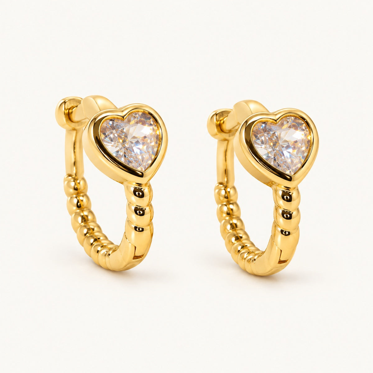 Beaded Heart CZ Huggies — Gold — white background