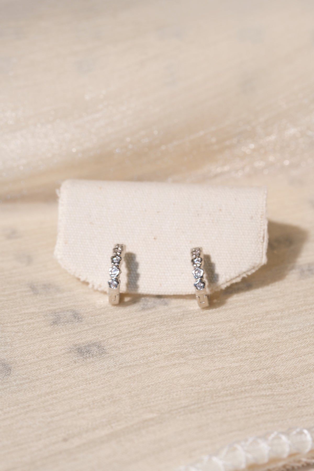 Heart Bezel CZ Hoops — Silver — edited real product photo