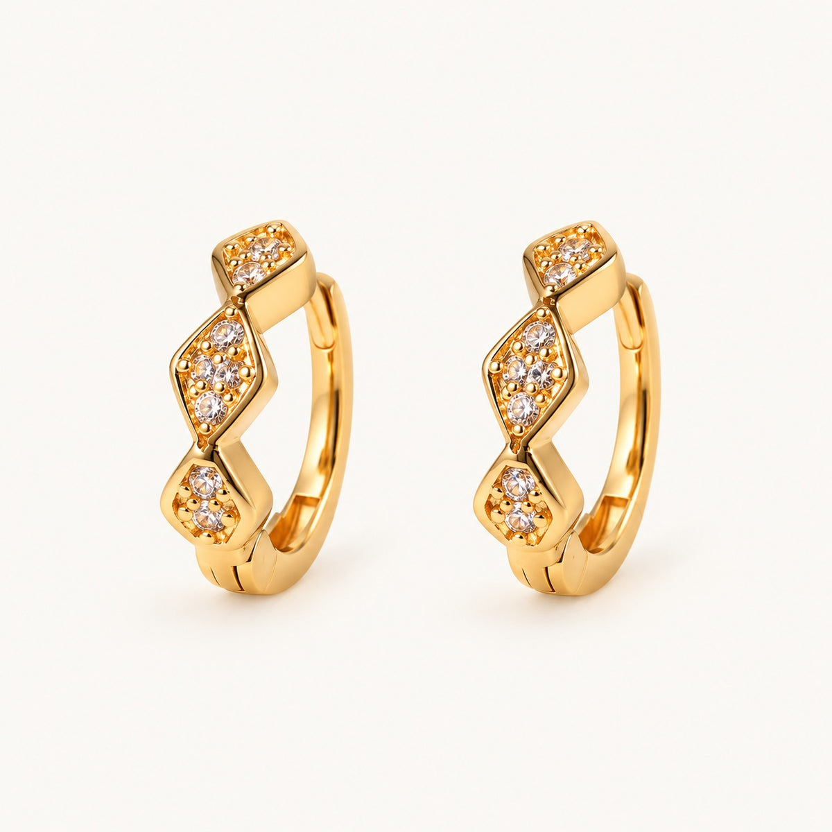 Geometric CZ Huggies — Gold — white background