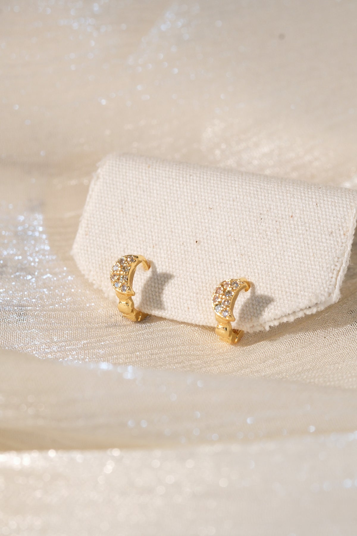 Crescent Pave Huggies — Gold — edited real product photo