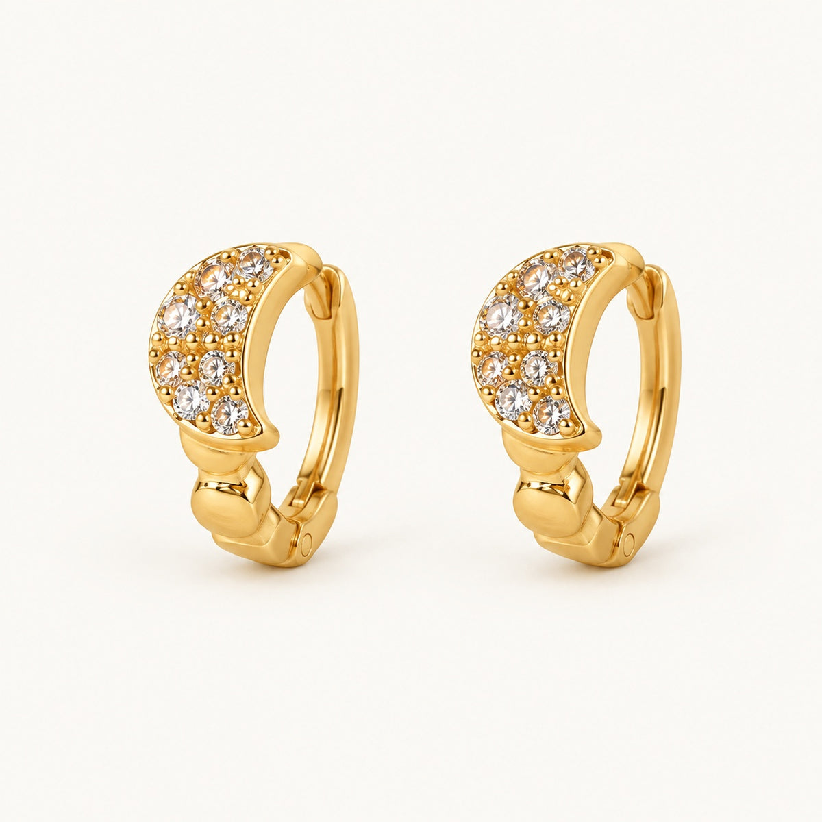 Crescent Pave Huggies — Gold — white background