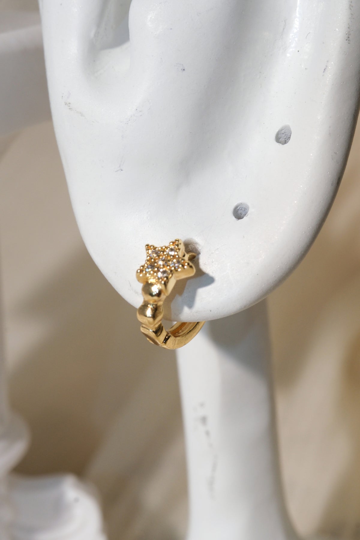 Star Pave Huggies — Gold — edited real product photo