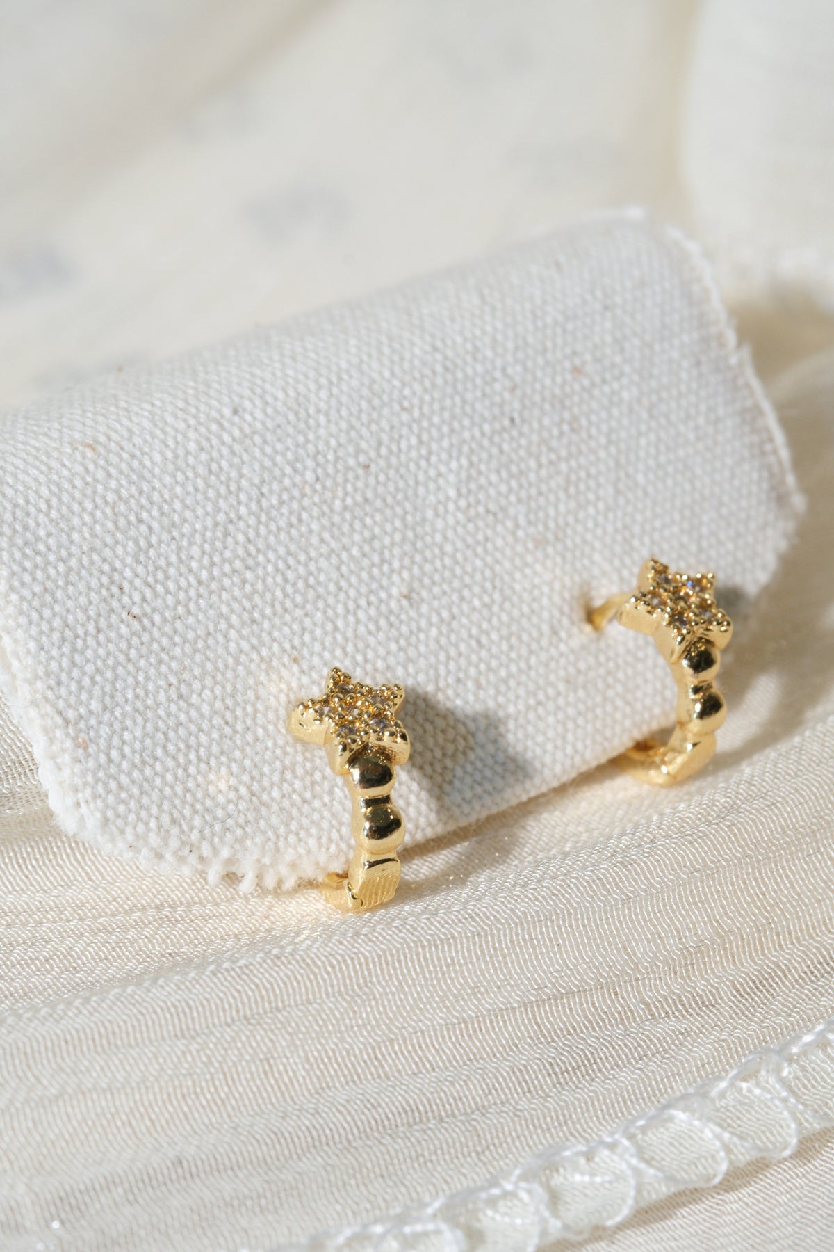 Star Pave Huggies — Gold — edited real product photo